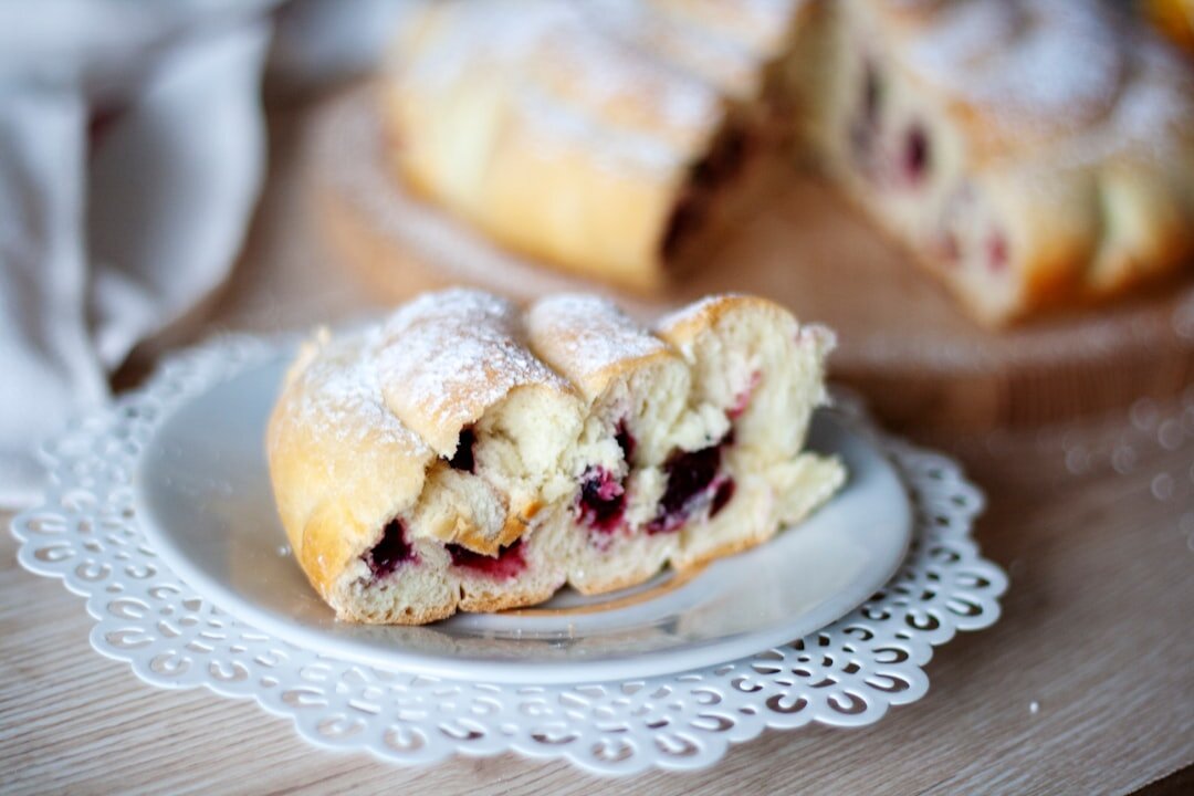 Traditional Czech koláče pastries with fruit filling on a plate