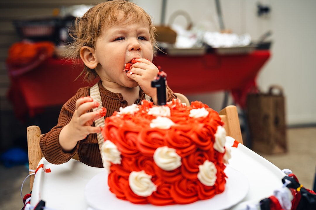 child eating cake
